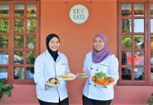 The sisters serving dishes from around the world