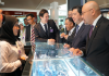 Shinwoo opens first duty-free shops at Brunei airport; plans to build local factory