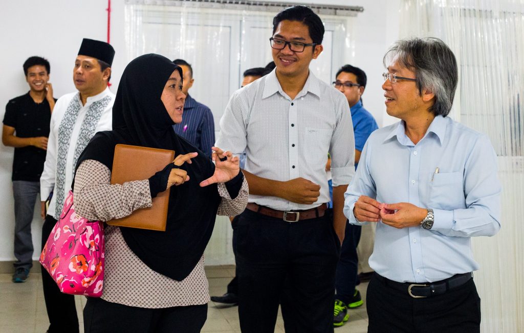 Local businesses talking to GC Managing Director Richard Chuang during an FDI-SME linkage session on Friday at GC's headquarters in Serambangun