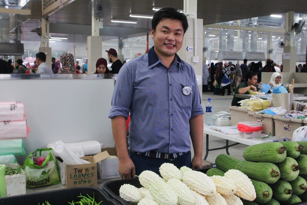 Javen Sui Soon Seng with is organic produce yesterday at the Gadong night market