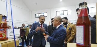 Behind the launch: Atoll expands FDI in Brunei with Mantap sauces Atoll's technical director Rajendrasinh (centre left) briefing MPRT Minister YB Dato Dr Hj Abdul Manaf during the official launch of Mantap on February 3.