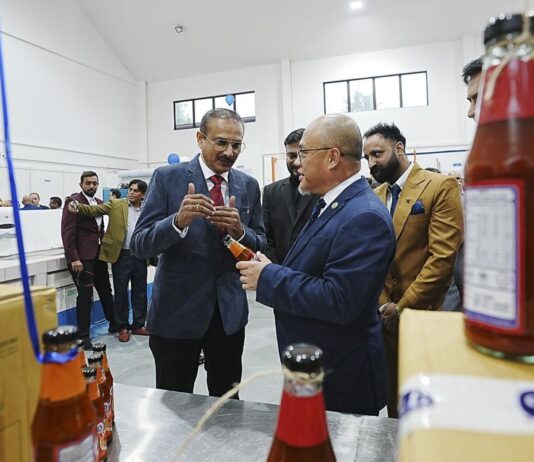Behind the launch: Atoll expands FDI in Brunei with Mantap sauces Atoll's technical director Rajendrasinh (centre left) briefing MPRT Minister YB Dato Dr Hj Abdul Manaf during the official launch of Mantap on February 3.